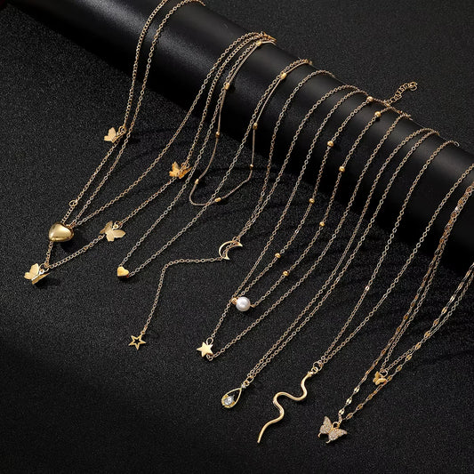 9 Pcs Multi-layered Gold Color Necklace Set for Women Fashion Zircon Pearl Heart Butterfly Star Moon Snake Pendant Necklaces Set