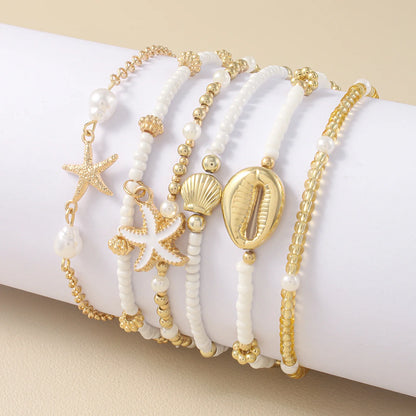 Bohemian Shell Starfish Bead Bracelet Set for Women Fashion Summer Beach Multilayer Stacked Pearl Bracelets Party Jewelry Gifts