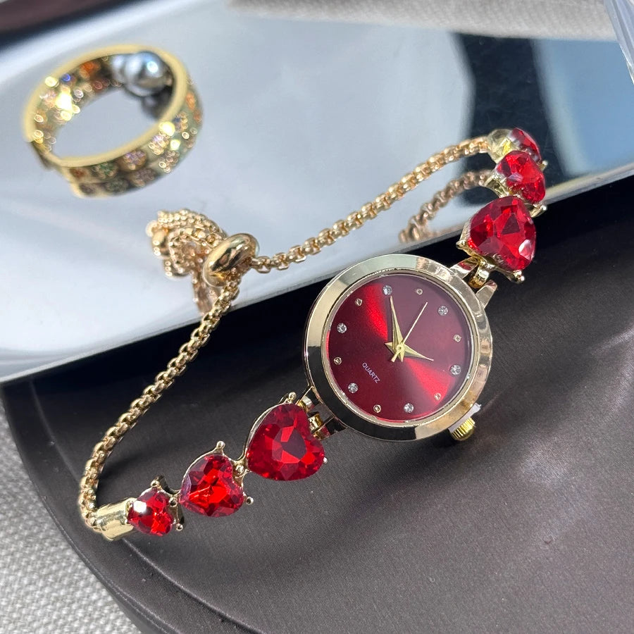 Ladies' quartz watch with three heart-shaped diamond-encrusted bracelet round alloy case and mixed scale simple light luxury