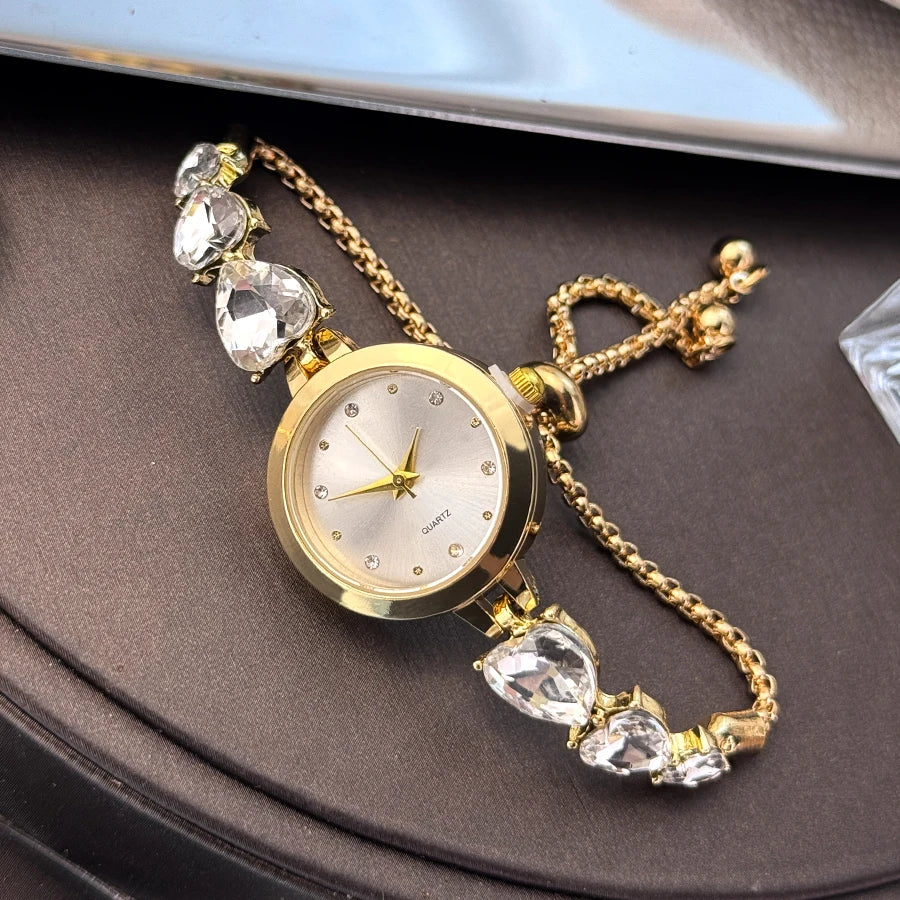 Ladies' quartz watch with three heart-shaped diamond-encrusted bracelet round alloy case and mixed scale simple light luxury